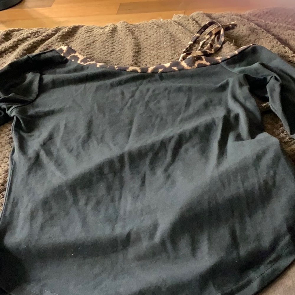 Black top with leopard border and shoulder strap with leopard print